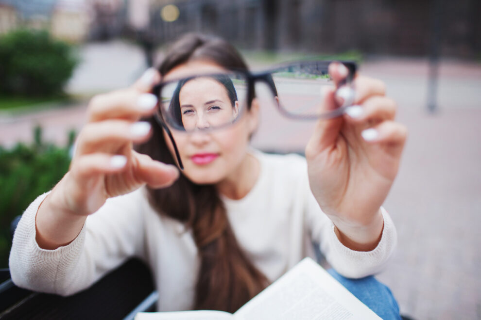 Closeup portrait of young women with glasses.